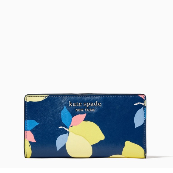 kate spade Handbags - KATE SPADE CAMERON LARGE SLIM BIFOLD WALLET